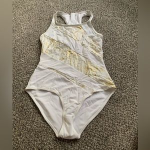 White and gold bathing suit